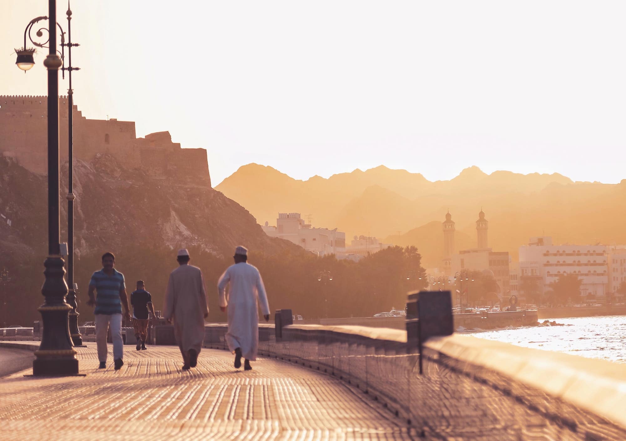 Life on Muscat street (waterfront) at sunset